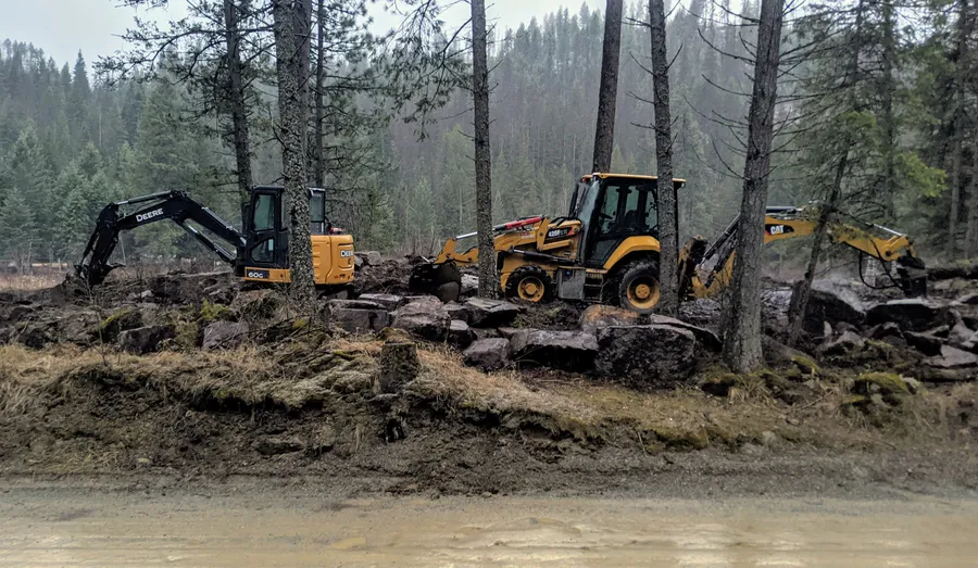 Backhoes on site before work