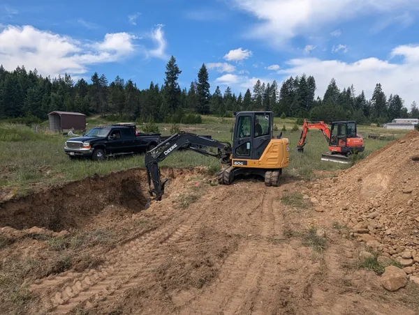 Digging the septic hole with excavator
