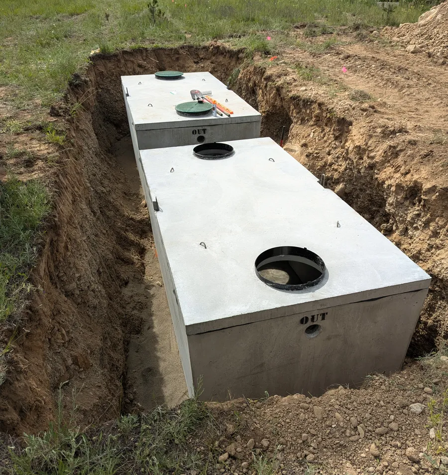Both septic tanks in place before backfill