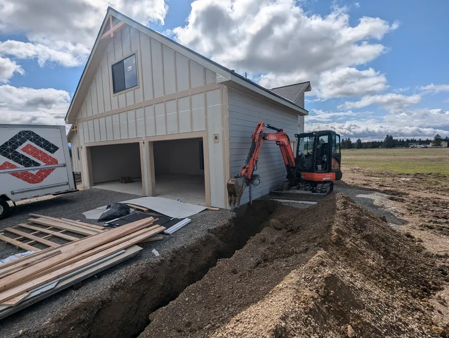 Trenching alongside a shop